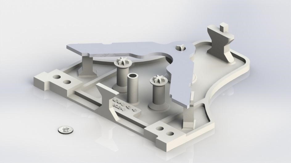 Stamped part positioned in 3D printed inspection support fixture.